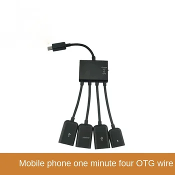 Мобильный телефон MICRO USB-концентратор OTG, подключенный к клавиатуре и мыши OTG-кабелем с четырьмя точками OTG-кабеля для передачи данных